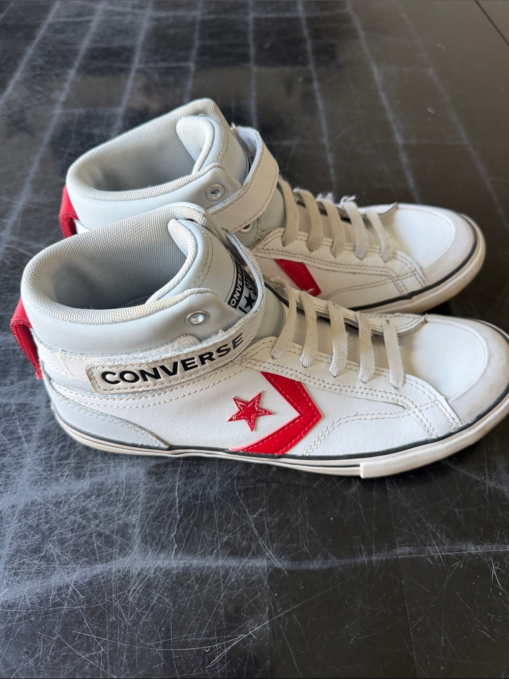 Converse White High-Top Sneakers with Red Chevron Star